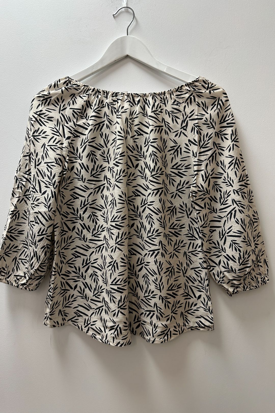 Skin and Threads Cream and Black Printed Tie Front Blouse 