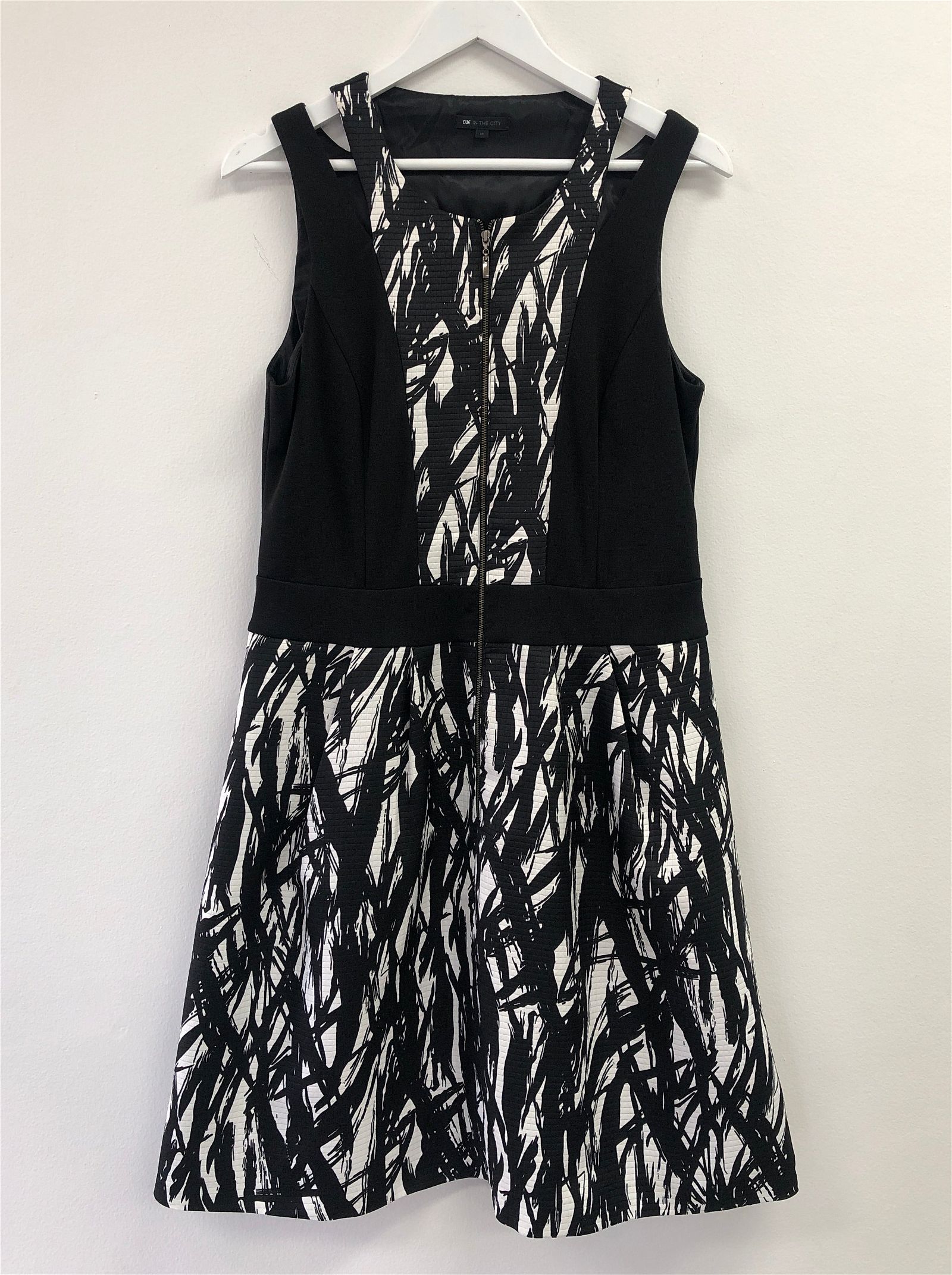 Cue in the City - Black and White Front Zip Dress